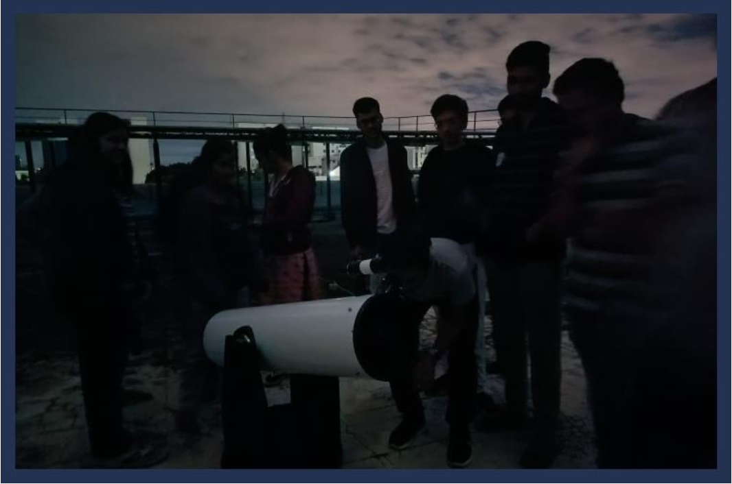 Telescope pointed at the night sky